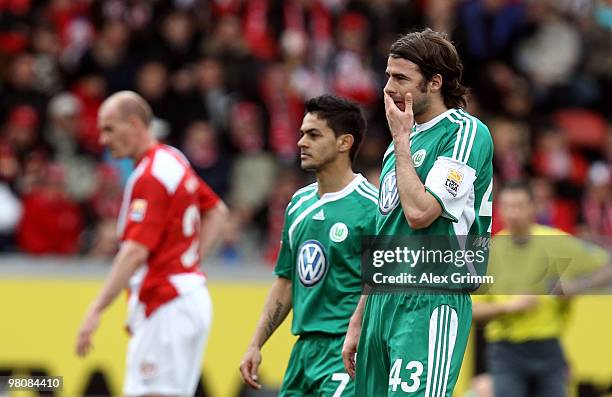 Andrea Barzagli and Josue of Wolfsburg react during the Bundesliga match between FSV Mainz 05 and VfL Wolfsburg at the Bruchweg Stadium on March 27,...