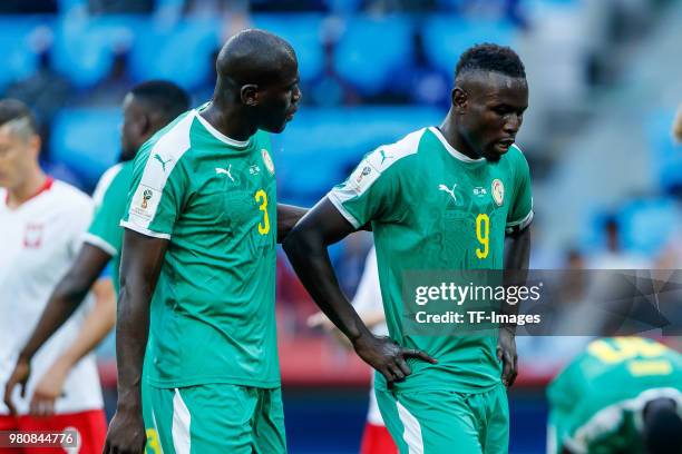 Kalidou Koulibali of Senegal speaks with Mame Diouf of Senegal during the 2018 FIFA World Cup Russia group H match between Poland and Senegal at...