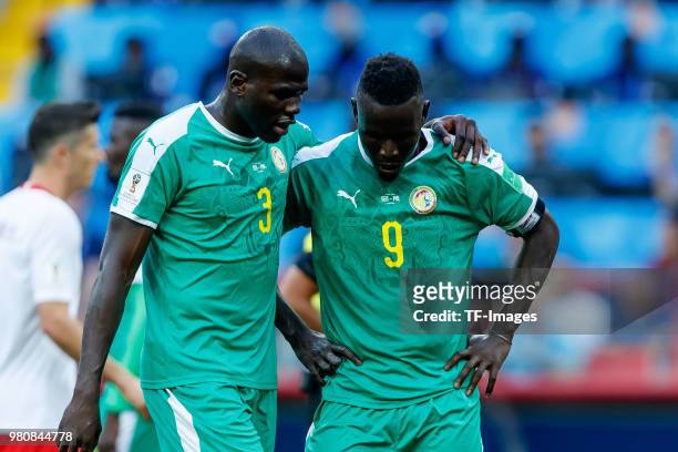 Kalidou Koulibali of Senegal speaks with Mame Diouf of Senegal during the 2018 FIFA World Cup Russia group H match between Poland and Senegal at...