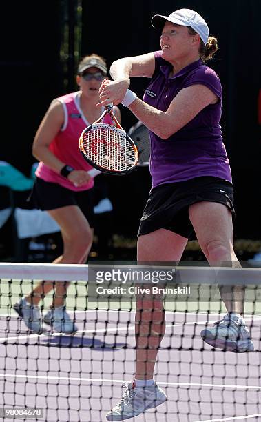Natalie Grandin and Abigail Spears play against Cara Black and Liezel Huber during day five of the 2010 Sony Ericsson Open at Crandon Park Tennis...