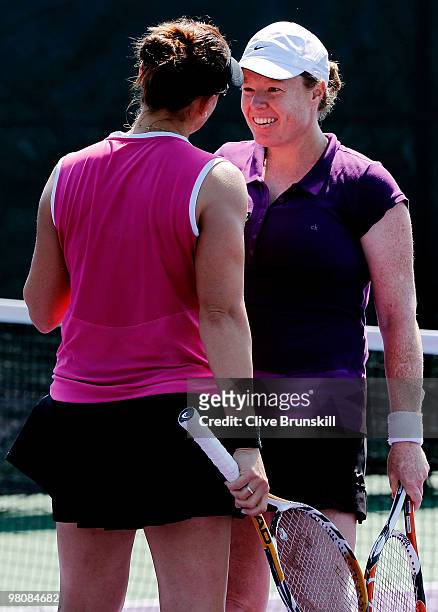 Natalie Grandin and Abigail Spears celebrate after defeating Cara Black and Liezel Huber during day five of the 2010 Sony Ericsson Open at Crandon...