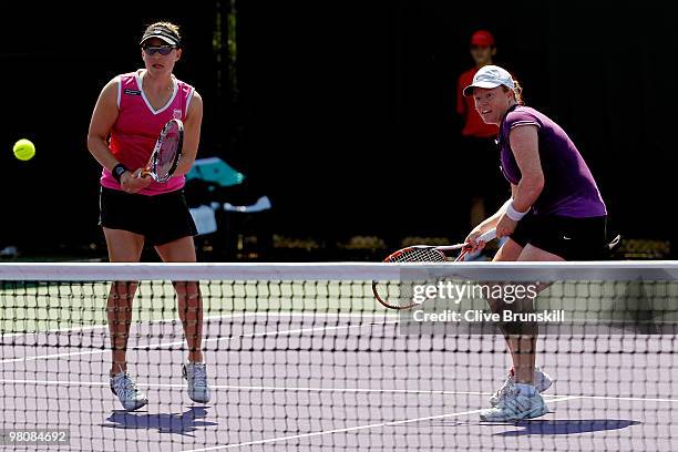 Natalie Grandin and Abigail Spears play against Cara Black and Liezel Huber during day five of the 2010 Sony Ericsson Open at Crandon Park Tennis...