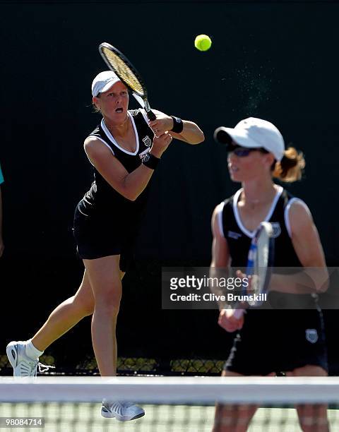 Cara Black and Liezel Huber play against Natalie Grandin and Abigail Spears during day five of the 2010 Sony Ericsson Open at Crandon Park Tennis...