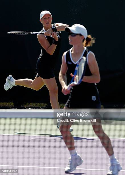 Cara Black and Liezel Huber play against Natalie Grandin and Abigail Spears during day five of the 2010 Sony Ericsson Open at Crandon Park Tennis...