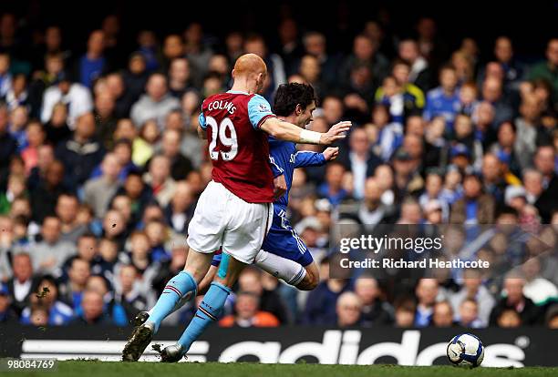 Yury Zhirkov of Chelsea goes to ground after a challenge by James Collins of Aston Villa leading to a penalty during the Barclays Premier League...