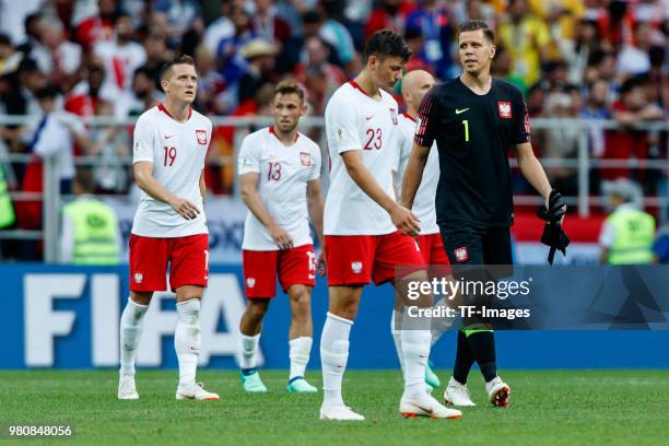 Piotr Zielinski of Poland, Maciej Rybus of Poland, Dawid Kownacki of Poland and Goalkeeper Wojciech Szczesny of Poland look dejected after the 2018...