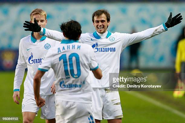 Danko Lazovic and Danny of FC Zenit St. Petersburg celebrate after scoring a goal during the Russian Football League Championship match between FC...