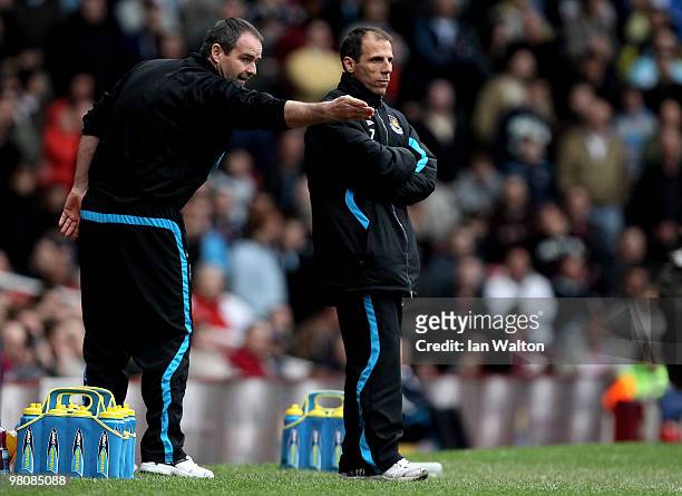 Gianfranco Zola the West Ham manager and Steve Clarke the West Ham assistant coach look on from the sidelines during the Barclays Premier League...