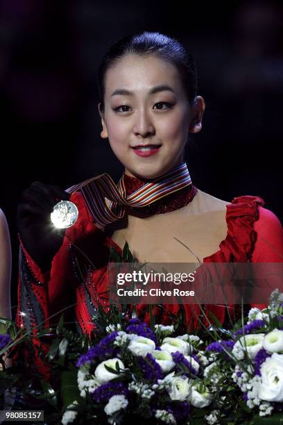 Mao Asada of Japan poses with her Gold medal on the podium after winning the Ladies Free Skate during the 2010 ISU World Figure Skating Championships...