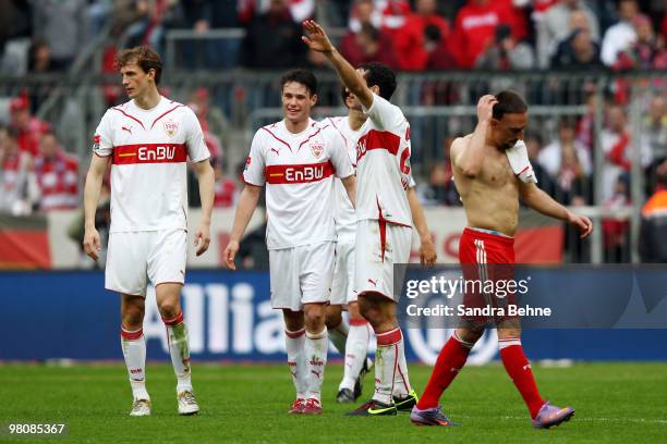 Stuttgart players celebrate their victory while Franck Ribery of Bayern Muenchen looks dejected during the Bundesliga match between FC Bayern...