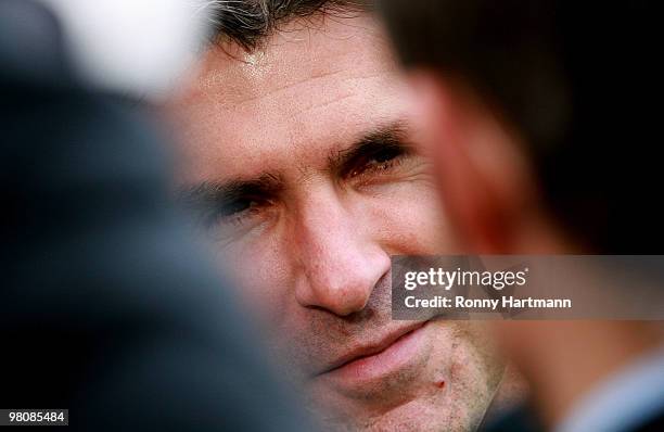 Head coach Zvonimir Soldo of Koeln smiles prior to the Bundesliga match between Hannover 96 and 1. FC Koeln at AWD Arena on March 27, 2010 in...