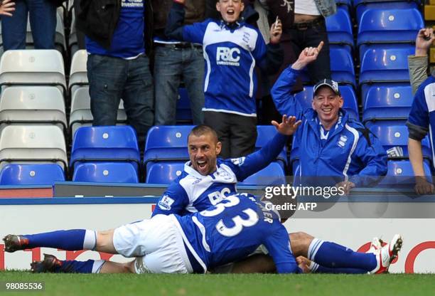 Birmingham City's English forward Kevin Phillips celebrates scoring a late equalizing goal in the English Premier League football match between...