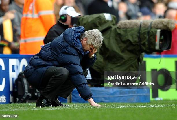 Arsene Wenger of Arsenal shows his dispair as Birmingham City score and equaliser during the Barclays Premier League match between Birmingham City...