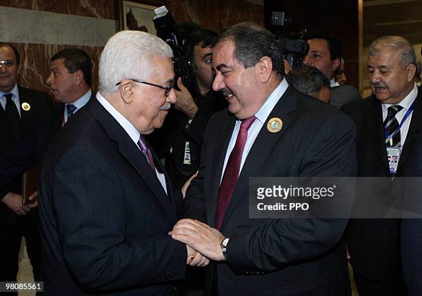 In this handout image supplied by the Palestinian Press Office , Palestinian President Mahmoud Abbas talking to Iraqi Foreign Minister Hoshyar Zebari...
