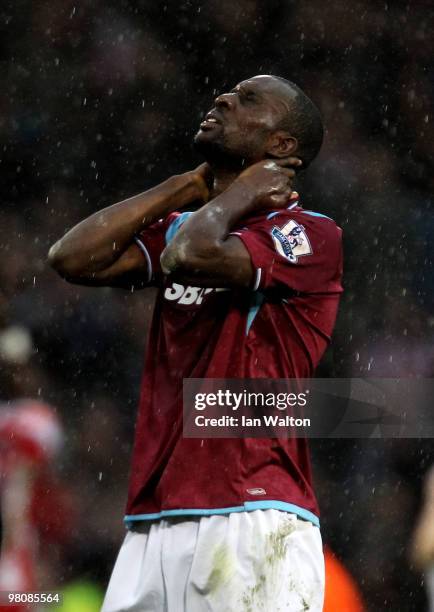 Dejected Carlton Cole of West Ham reacts after his team lose 1-0 during the Barclays Premier League match between West Ham United and Stoke City at...