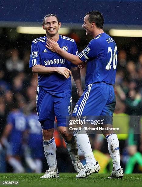 Frank Lampard of Chelsea celebrates scoring four goals with John Terry during the Barclays Premier League match between Chelsea and Aston Villa at...