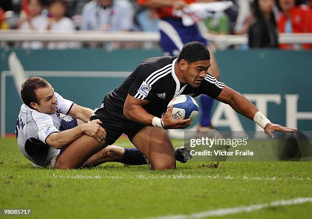 Fritz Lee of New Zealand reaches over the line to score a try against Scotland on day two of the IRB Hong Kong Sevens on March 27, 2010 in Hong Kong.