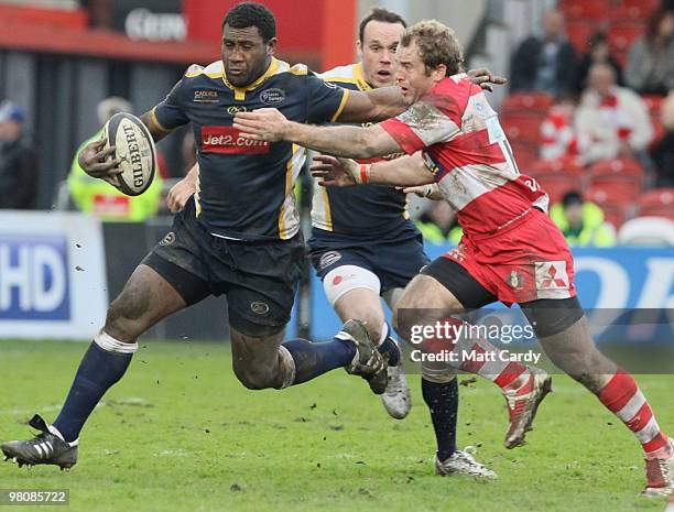 Seru Rabeni of Leeds is tackled by James Simpson-Daniel of Gloucester during the Guinness Premiership match between Gloucester and Leeds Carnegie on...