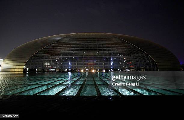 The National Grand Theater is seen during the Earth Hour 2010 on March 27, 2010 in Beijing, China. Earth hour this year aims to highlight everyone's...