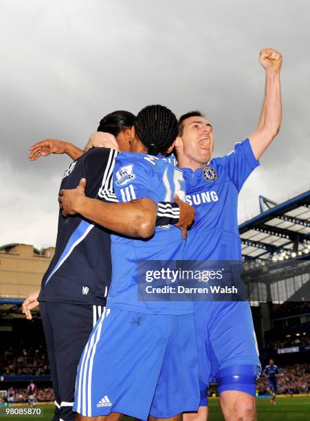 Frank Lampard of Chelsea celebrates with scorer Florent Malouda during the Barclays Premier League match between Chelsea and Aston Villa at Stamford...