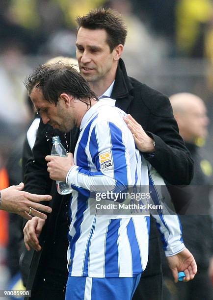 Theofanis Gekas of Berlin and manager Michael Preetz are pictured during the Bundesliga match between Hertha BSC Berlin and Borussia Dortmund at...