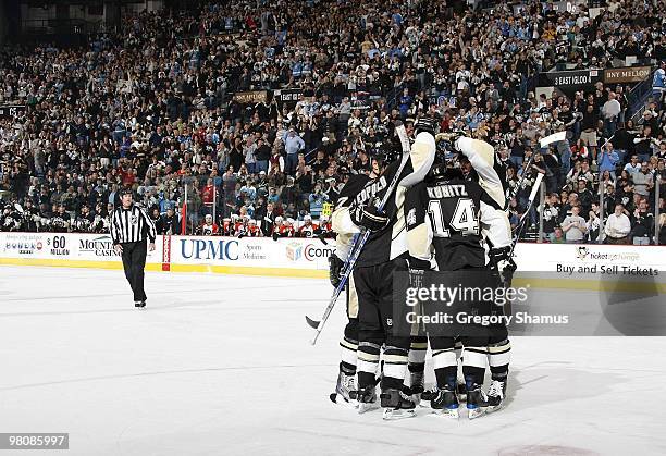 Chris Kunitz of the Pittsburgh Penguins celebrates his goal with teammates against the Philadelphia Flyers on March 27, 2010 at Mellon Arena in...