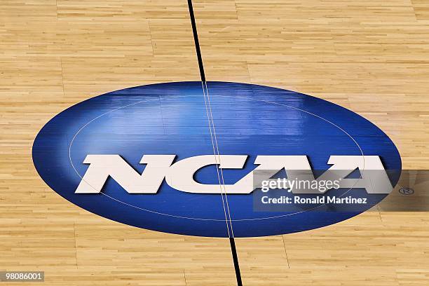 Detail of a NCAA logo decal is seen at center court as the Kansas State Wildcats play against the Brigham Young Cougars during the second round of...
