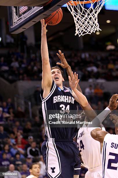 Noah Hartsock of the Brigham Young Cougars attempts a shot against the Kansas State Wildcats during the second round of the 2010 NCAA men's...