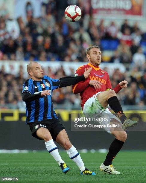 Wesley Sneijder of Inter and Daniele De Rossi of Roma in action during the Serie A match between AS Roma and FC Internazionale Milano at Stadio...