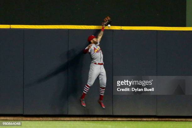 Tommy Pham of the St. Louis Cardinals fails to catch a fly ball in the seventh inning against the Milwaukee Brewers at Miller Park on June 21, 2018...