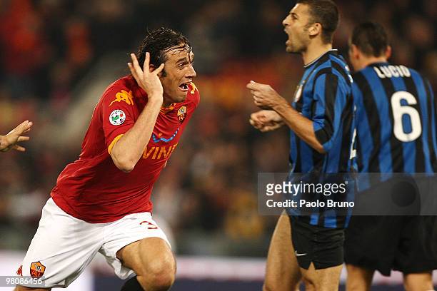 Luca Toni of AS Roma celebrates after scoring the second goal during the Serie A match between AS Roma and FC Internazionale Milano at Stadio...