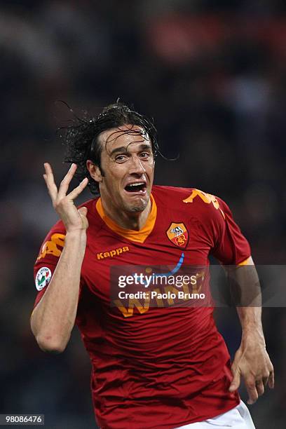 Luca Toni of AS Roma celebrates after scoring the second goal during the Serie A match between AS Roma and FC Internazionale Milano at Stadio...