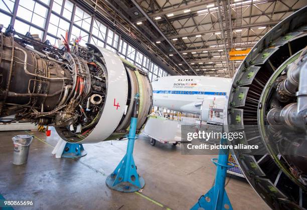 March 2018, Germany, Hamburg: A plane for stratospheric research manufactured by Boing stands in the maintenance hall. Lufthansa Technik's board is...