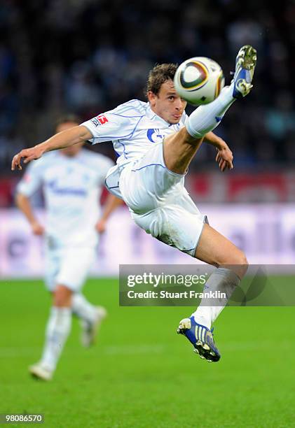 Rafinha of Schalke shoots during the Bundesliga match between Bayer 04 Leverkusen and FC Schalke 04 at BayArena on March 27, 2010 in Leverkusen,...