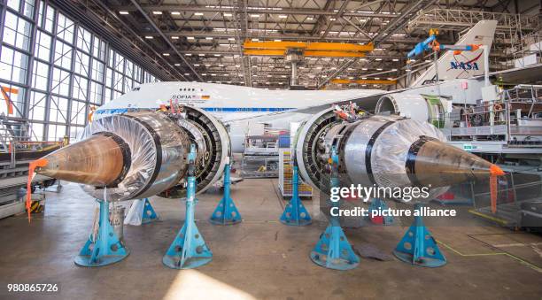 Dpatop - 19 March 2018, Germany, Hamburg: A plane for stratospheric research manufactured by Boing stands in the maintenance hall. Lufthansa...