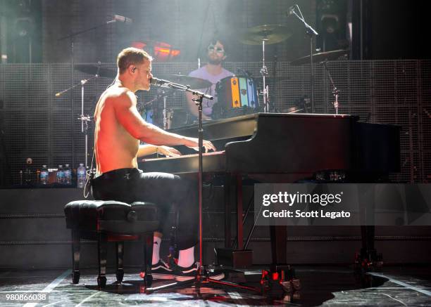 Dan Reynolds of Imagine Dragons performs during their Evolve World Tour 2018 at DTE Energy Music Theater on June 21, 2018 in Clarkston, Michigan.