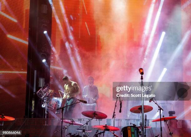 Dan Reynolds and Daniel "Z" Platzman of Imagine Dragons perform during their Evolve World Tour 2018 at DTE Energy Music Theater on June 21, 2018 in...