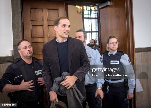 March 2018, Germany, Dortmund: Former Borussia Dortmund manager Thomas Tuchel leaves court after testifying as a witness. In April of 2017, three...