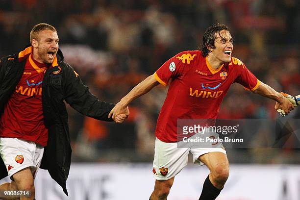 Luca Toni with his teammate Daniele De Rossi of AS Roma celebrates the victory after the Serie A match between AS Roma and FC Internazionale Milano...