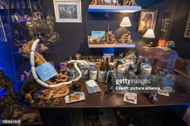 March 2018, Germany, Passau: Dachshund figurines of various types and sizes are on display at the Dachshund Museum. Photo: Armin Weigel/dpa