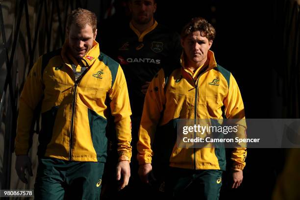 David Pocock and Michael Hooper of the Wallabies walk down the players race during the Australian Wallabies captain's run at Allianz Stadium on June...