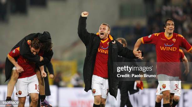 Francesco Totti , Daniele De Rossi and Luca Toni of AS Roma celebrate the victory after the Serie A match between AS Roma and FC Internazionale...