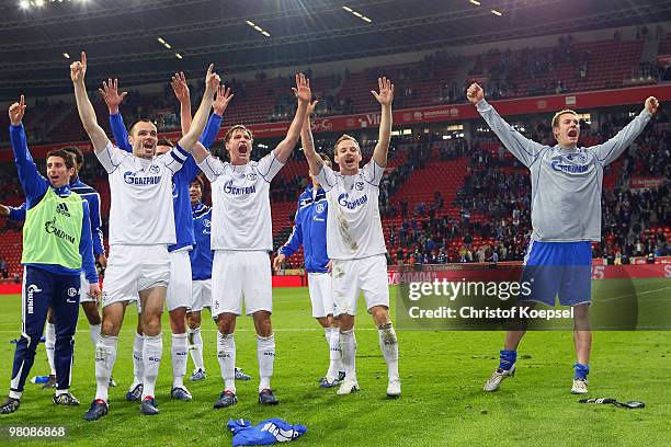 Basart Ibraimi, Heiko Westermann, Benedikt Hoewedes, Ivan Rakitic and Manuel Neuer of Schalke celebrate the 2:0 victory after the Bundesliga match...