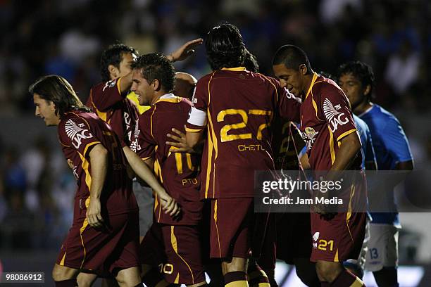 Estudiante's player Osvaldo Alanis celebrates with teammates his scored goal against Cruz Azul their match as part of the Bicentenario 2010...