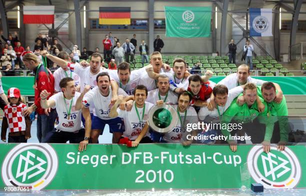 Players of SD Croatia Berlin celebrate after winning the final of the DFB futsal cup at the Lausitz-Arena on March 27, 2010 in Cottbus, Germany.