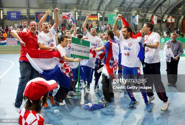 Players of SD Croatia Berlin celebrate after winning the final of the DFB futsal cup at the Lausitz-Arena on March 27, 2010 in Cottbus, Germany.