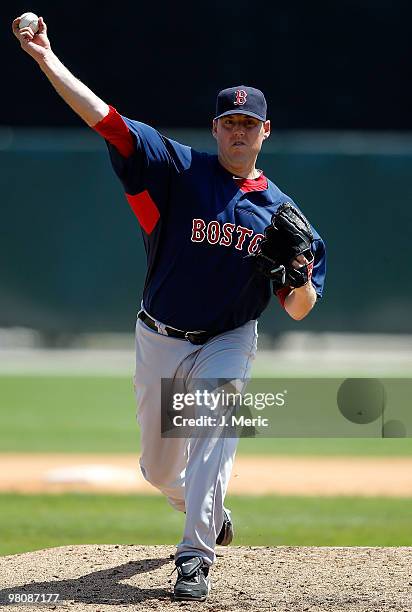 Pitcher John Lackey of the Boston Red Sox pitches against the Baltimore Orioles during a Grapefruit League Spring Training Game at Ed Smith Stadium...