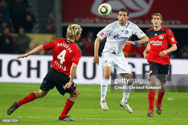 Sami Hyypiae of Leverkusen challenges Kevin Kuranyi of Schalke during the Bundesliga match between Bayer Leverkusen and FC Schalke 04 at the BayArena...