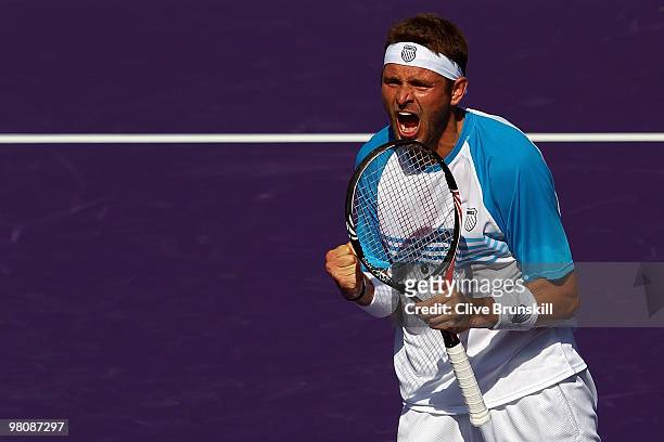 Mardy Fish of the United States reacts after defeating Andy Murray of Great Britain during day five of the 2010 Sony Ericsson Open at Crandon Park...