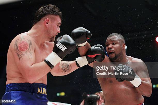 Juan Carlos Gomez of Cuba fights Alex Mazikin of Russia during the heavyweight WBA international championship fight during the ran boxen knockout...